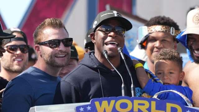Feb 16, 2022; Los Angeles, CA, USA; Los Angeles Rams coach Sean McVay (left) and defensive coordinator Raheem Morris react during Super Bowl LVI championship rally at the Los Angeles Memorial Coliseum.